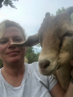 selfie of Deborah and her goat Maverick