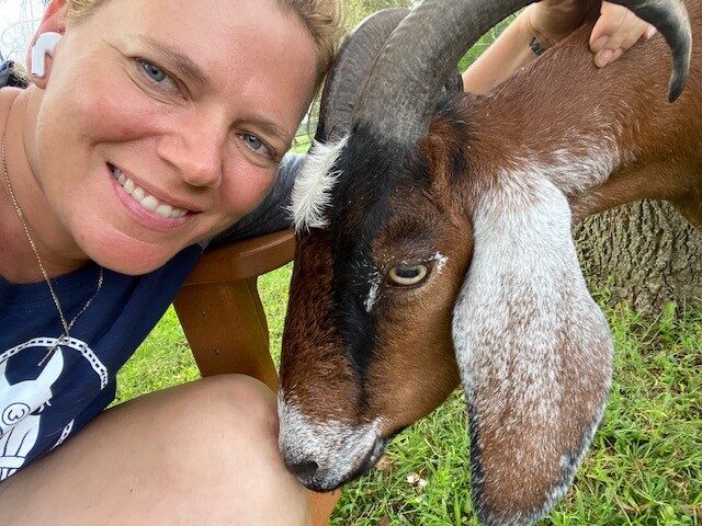 selfie of Deborah and her goat Wyatt